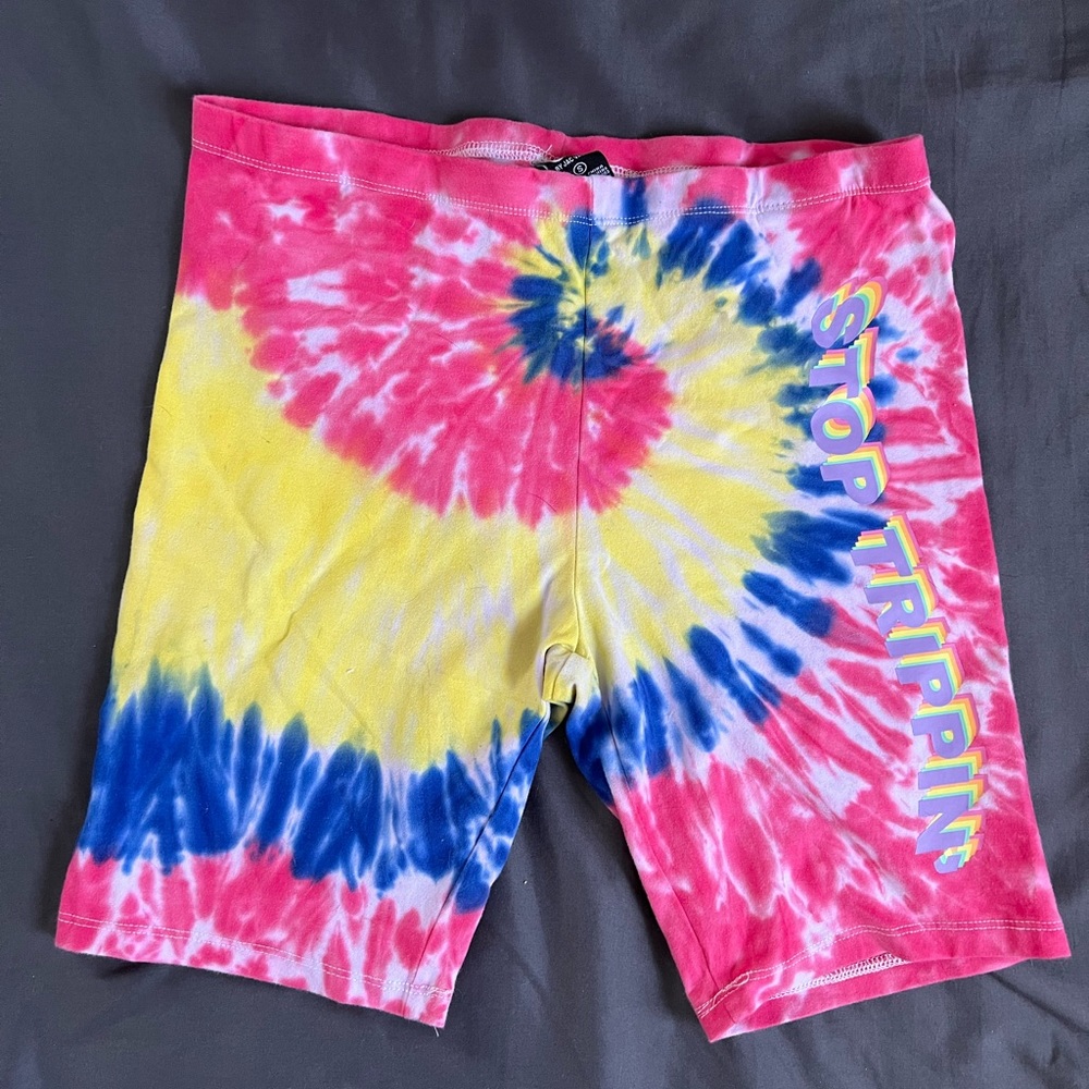 tie dye “stop trippin” biker shorts